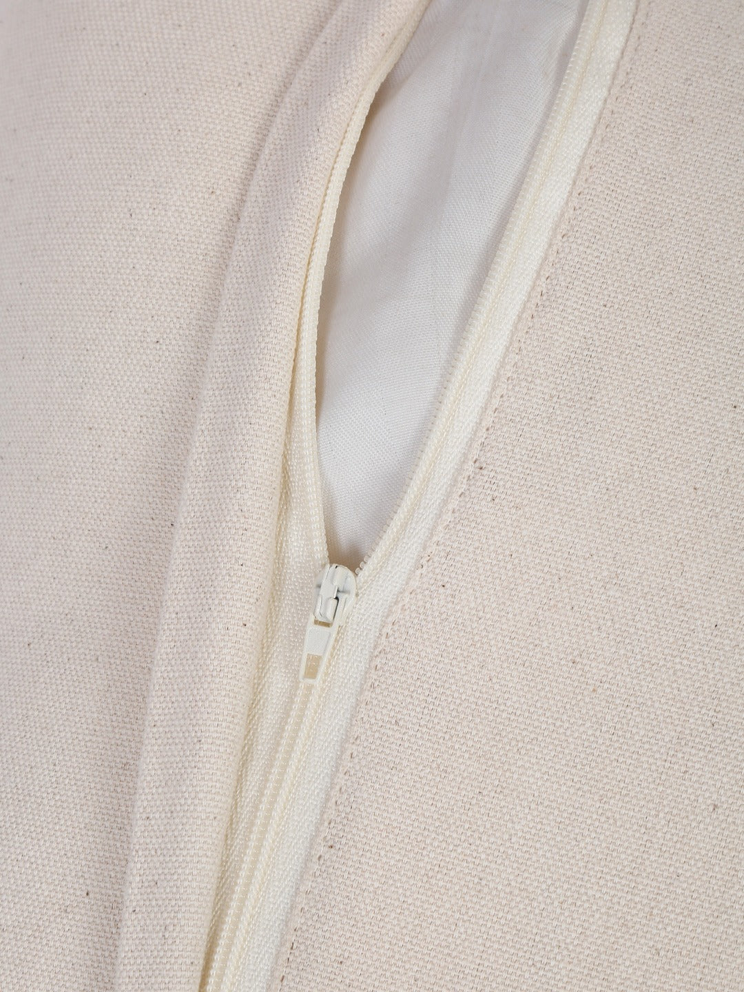 Close-up of hidden zipper on cotton cushion cover