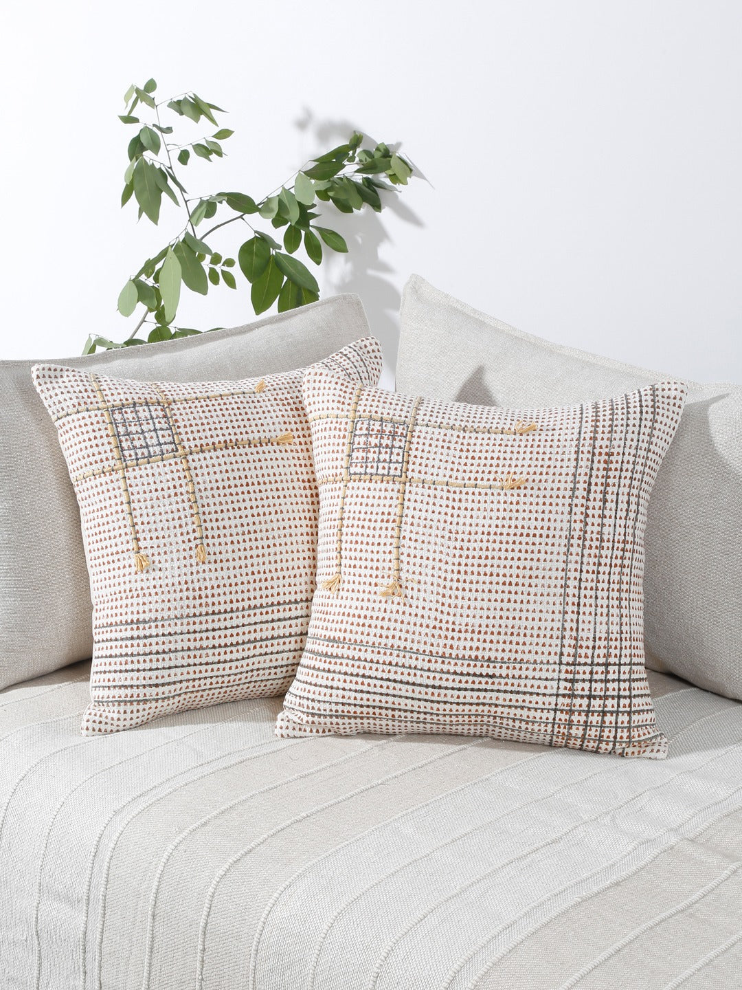 Hand block printed cotton cushion covers styled on sofa