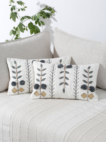Hand embroidered cotton pillow cover styled on sofa